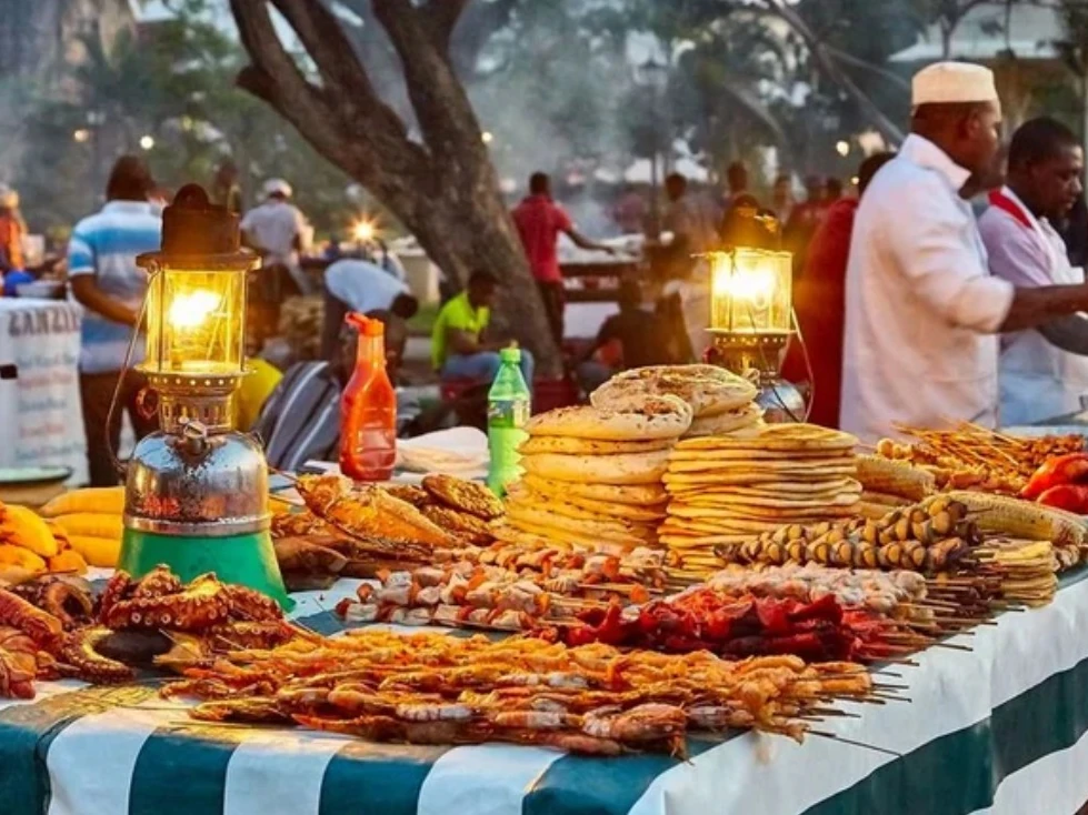 Grilled seafood and snacks at the Forodhani night market in Stone Town, Zanzibar